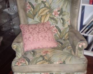 Upholstered chair and ottoman