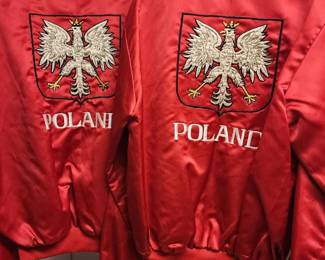 Two red satin bomber jackets featuring the embroidered Polish Eagle (They do have names of owners on the front of jacket)