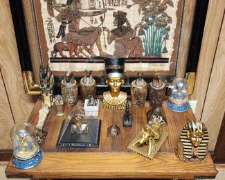 Egyptian statues, pyramids, and decorative items