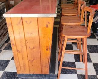  Rustic wooden bar with a red countertop
