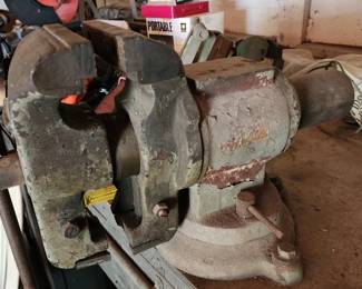 Rock Island bench vise with a heavy-duty metal clamp