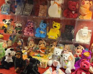 Ty Beanie Babies stuffed animals arranged in clear plastic cases