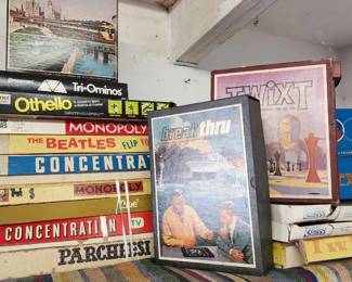 Monopoly, Twixt, and Breakthrough. The assortment reflects a mid-20th-century era of popular family entertainment