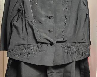 Vintage black three-button blazer with intricate floral embroidery and matching black skirt