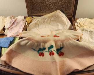 Vintage baby clothes (There are bags of Kids clothing and Doll clothing in this home)
