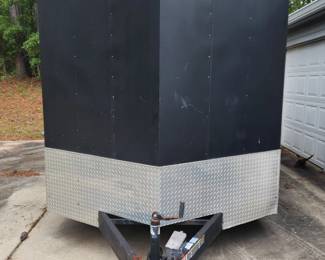 Black enclosed cargo trailer