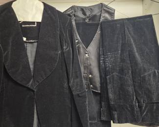 Black velvet blazer, matching trousers, and a satin vest