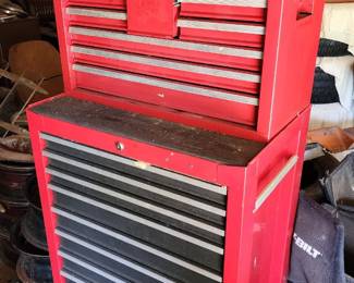irestone rolling tool chest with multiple drawers, stacked on top of a smaller matching cabinet