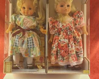 Madame Alexander dolls dressed in colorful, patterned dresses
