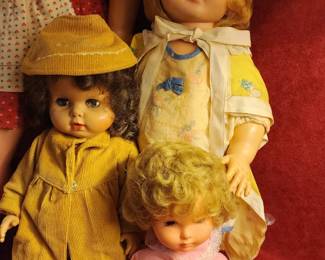 Vintage dolls dressed in colorful