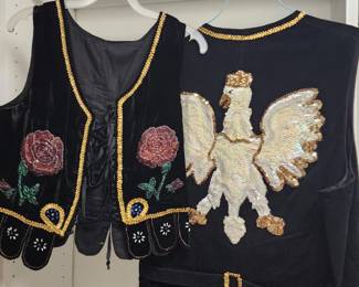 black velvet vest adorned with gold trim, featuring intricate beadwork in the shape of roses and an eagle