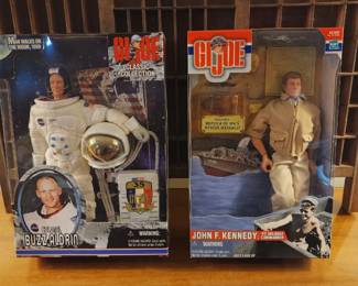 GI Joe Classic Collection action figures, one depicting Colonel Buzz Aldrin in a NASA spacesuit and the other portraying John F. Kennedy in a military uniform