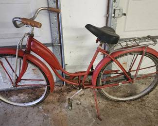  Vintage Schwinn ladies' bicycle in red