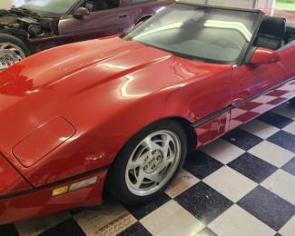 1990 CHEVROLET CORVETTE  A 1990 Corvette Convertible 6-speed manual transmission in very good condition (some paint damage on the hood).  156,346 miles