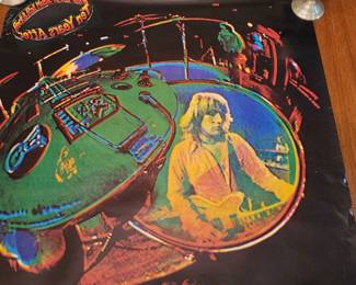  Poster of Ten Years After’s 1972 album Rock & Roll Music to the World, featuring a colorful depiction of a drummer and bassist in front of a drum kit