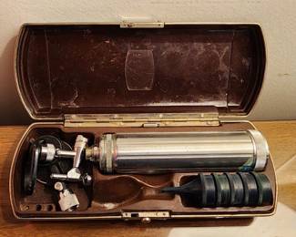 Welch Allyn Otoscope set in its original case, complete with a metal tube