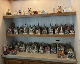Christmas village pieces and ceramic animal figurines