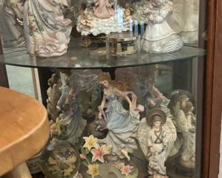 angels. ceramic, music boxes, and clocks