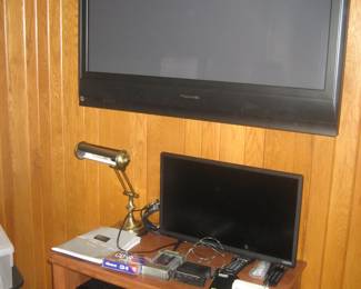 Panasonic and Vizio flat screen TVs, media cabinet, lamp