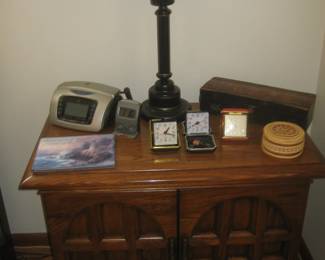 Thomasville night stand, metal table lamp, small clocks