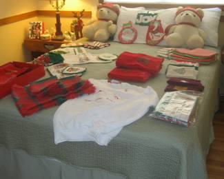 Queen bed, Santa bears, holiday linens
