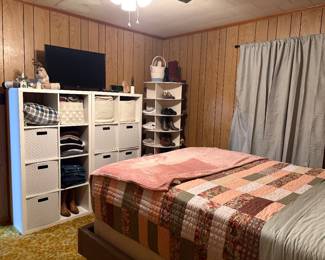 Storage Shelves with fabric bins & rotating shoe rack. 