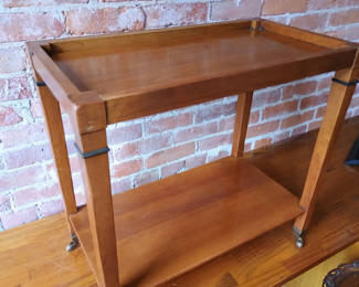 Lot 167: French tea table on wheels