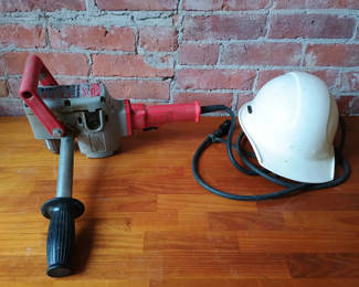 Lot 157: Milwaukee Hole Hawg electric drill with safety helmet