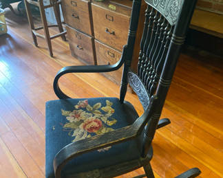 Lot 173: Antique Press Back Rocking Chair