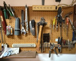 Assorted Hand Tools on Pegboard