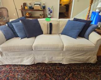 Couch with Washable Slip Covers.  Older Style Couch Underneath but great price!