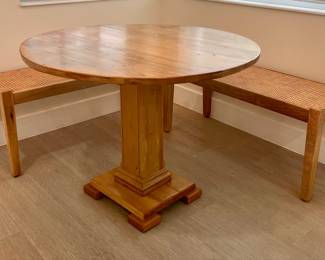 Round Pedestal Dining Table with Two Cane Benches