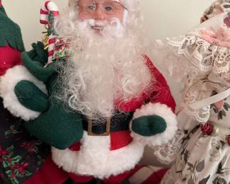 Animated Musical Santa Claus Figure with Candy Cane and Gift Bag