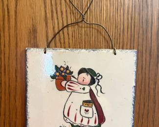 Hand-Painted Ceramic Plaque with Girl Holding Flowers