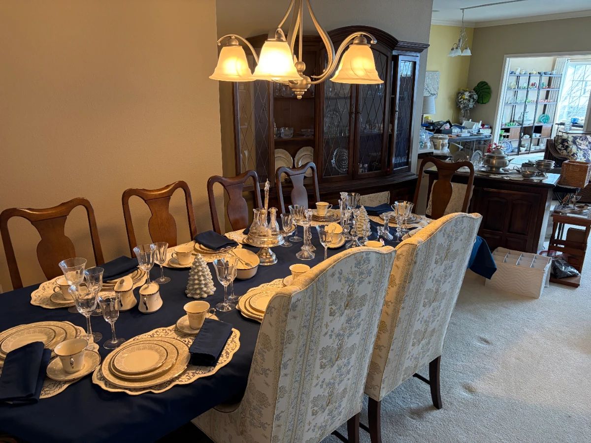 Ethan Allen oval double pedestal table with 2 leaves, china cabinet & server.