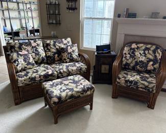 Rattan loveseat, chair & storage ottoman.