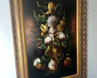 Classic floral still life oil painting in a heavy, ornate gold gilt frame