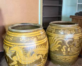 Pair of massive, spectacular Asian floor urns with golden embossed dragon motifs