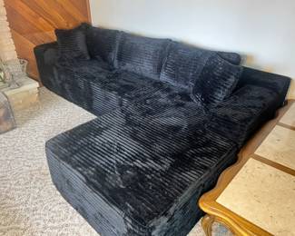 Brand new charcoal grey corduroy sectional sofa—the perfect addition to a family room