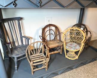 A charming collection of doll-sized furniture including wicker and Adirondack styles