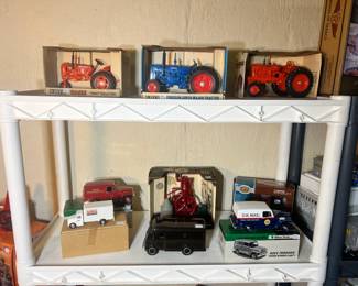 Vintage specialty vehicles including a Case tractor and a U.S. Mail Jeep