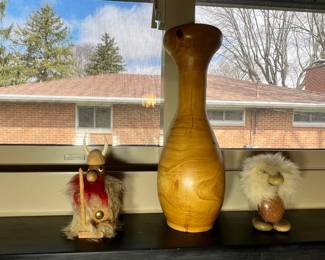 Whimsical Scandinavian wood-carved figures including a Viking and a troll