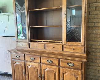 Large, stately lighted solid wood china hutch with glass display doors