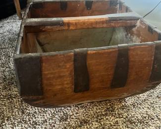Rugged, authentic primitive wooden trough with iron banding
