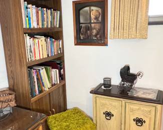 Cozy office corner featuring a walnut-finish bookcase and a French Provincial accent cabinet