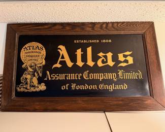Ca. 1900 Atlas Assurance Company Limited of London, England tin metal sign.  28”W x 14 1/2”T