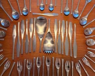 63 piece set of vintage Dansk ‘Odin’ stainless steel flatware. This set comes in four custom smokey black acrylic cases, two have custom walnut insterts