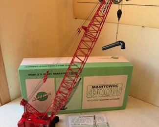 Manitowoc 4100W crawler crane in 1:50 scale with original box and manual.  This is in excellent condition! 