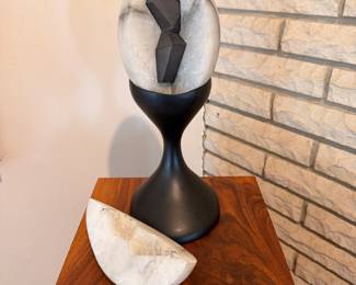 “The Egg” alabaster and graphite sculpture on wood base with lit acrylic cover.  This will be sold on the custom walnut stand.  Created by our client in 1967
