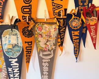 A sampling of the large collection of vintage pendants, from college, sports, national parks and more